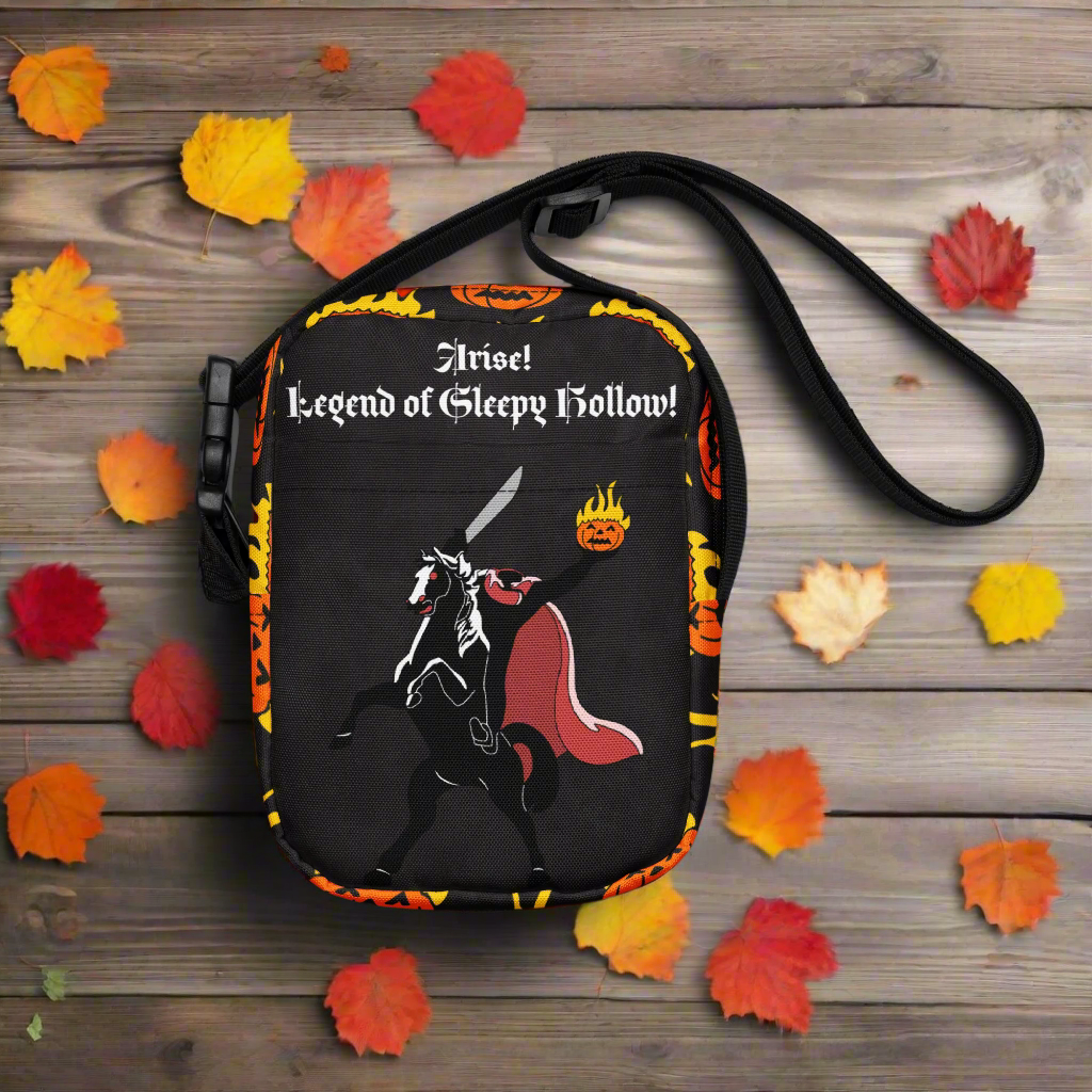 Black crossbody bag with 'Legend of Sleepy Hollow' design featuring a horse and text on a white background.