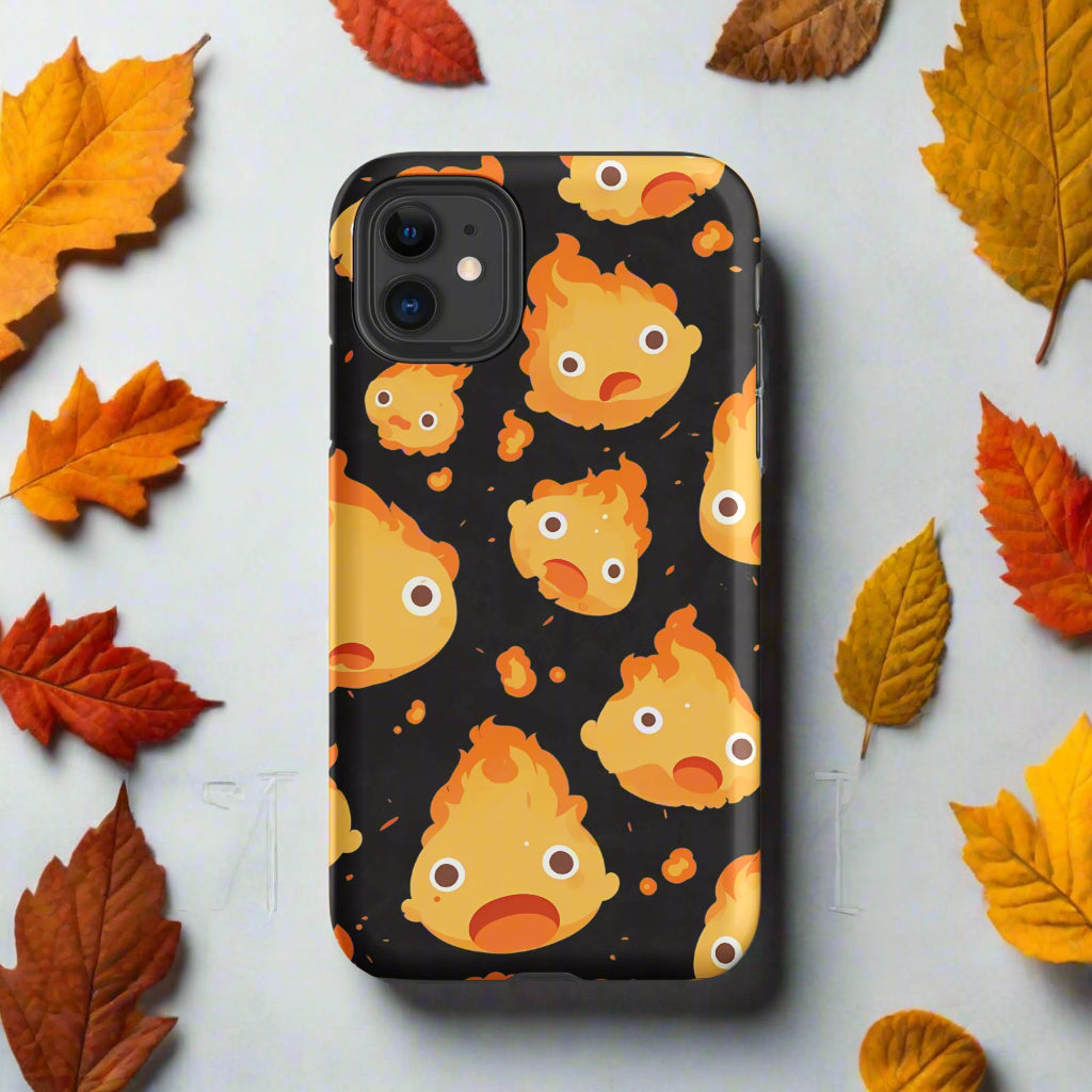 Calcifer | Tough Case for iPhone® - Syntax & Alchemy - Protect your phone with style using a durable, dual-layered case. The outer shell is made of impact-resistant polycarbonate, while the inner lining sports TPU lining for maximum impact absorption. Keep your phone fashionable and safe all year round! Features:• Polycarbonate outer shell• Thermoplastic Polyurethane TPU inner liner• Dual-layer protection• Precisely aligned port openings• Induction charging compatible