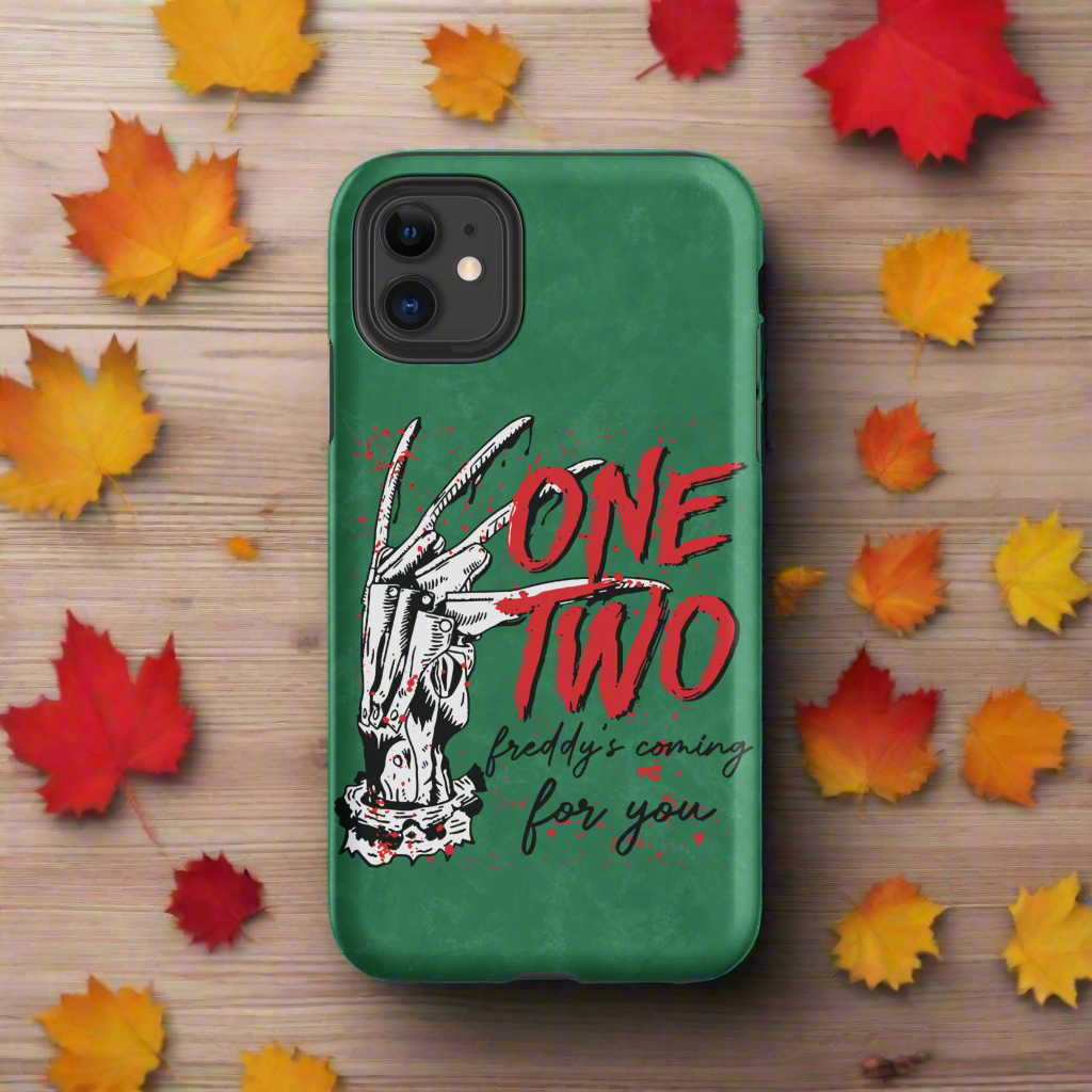 Nightmare On Elm Street | Tough Case for iPhone® - Syntax & Alchemy - Protect your phone with style using a durable, dual-layered case. The outer shell is made of impact-resistant polycarbonate, while the inner lining sports TPU lining for maximum impact absorption. Keep your phone fashionable and safe all year round!Features:• Polycarbonate outer shell• Thermoplastic Polyurethane TPU inner liner• Dual-layer protection• Precisely aligned port openings• Induction charging compatible