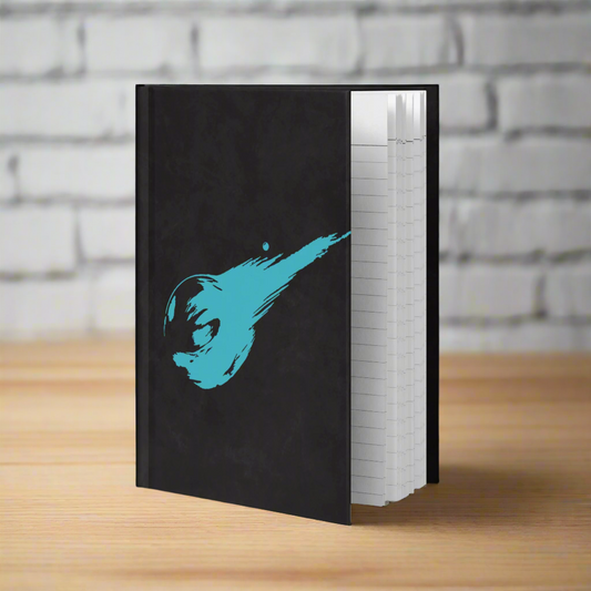 Black notebook with a blue abstract design on a white background