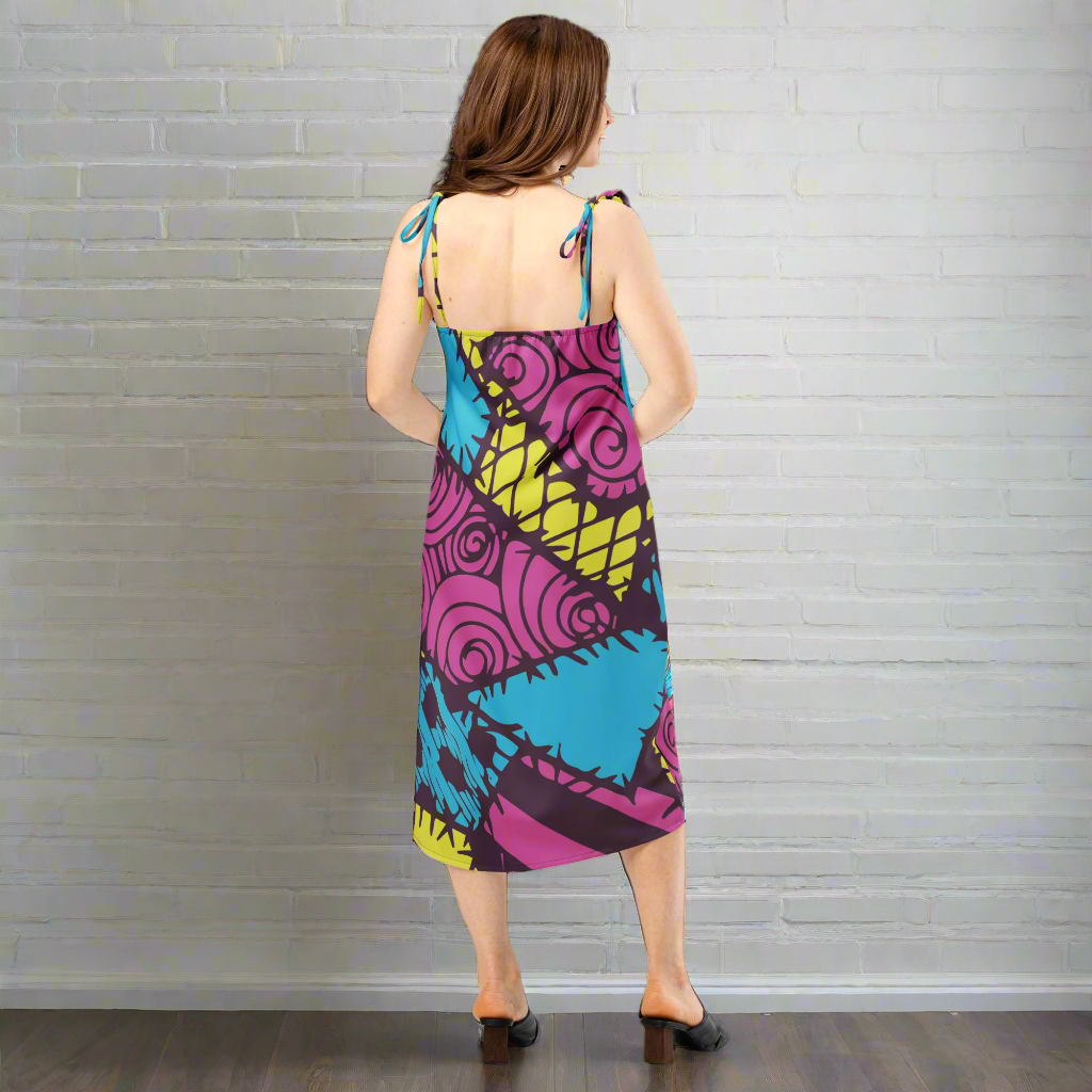 Sally | Midi Dress - Syntax & Alchemy - Floaty, Flirty, and Totally FlatteringFrom garden parties to candlelit dinners, this midi dress is made to move with you. Its breezy silhouette and thoughtful details deliver effortless style—just slip it on and go. Features: Made from 100% heavy polyester chiffon Lightweight Midi length with elegant front side slit Flattering V-neckline Adjustable tie-close shoulder straps for a custom fit Built-in bra for extra support and ease Relaxed fit for comfort and flow