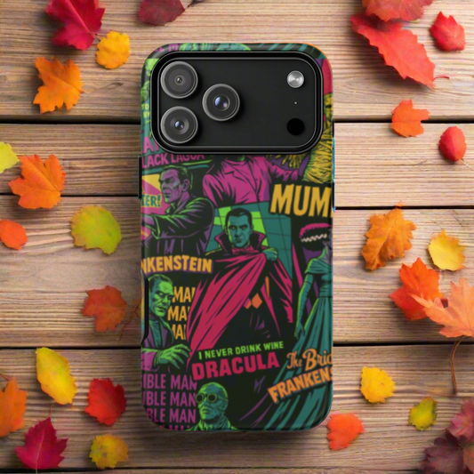 Universal Monsters | Tough Case for iPhone® - Syntax & Alchemy - Protect your phone with style using a durable, dual-layered case. The outer shell is made of impact-resistant polycarbonate, while the inner lining sports TPU lining for maximum impact absorption. Keep your phone fashionable and safe all year round! • Polycarbonate outer shell • Thermoplastic Polyurethane TPU inner liner • Dual-layer protection • Precisely aligned port openings • Induction charging compatible